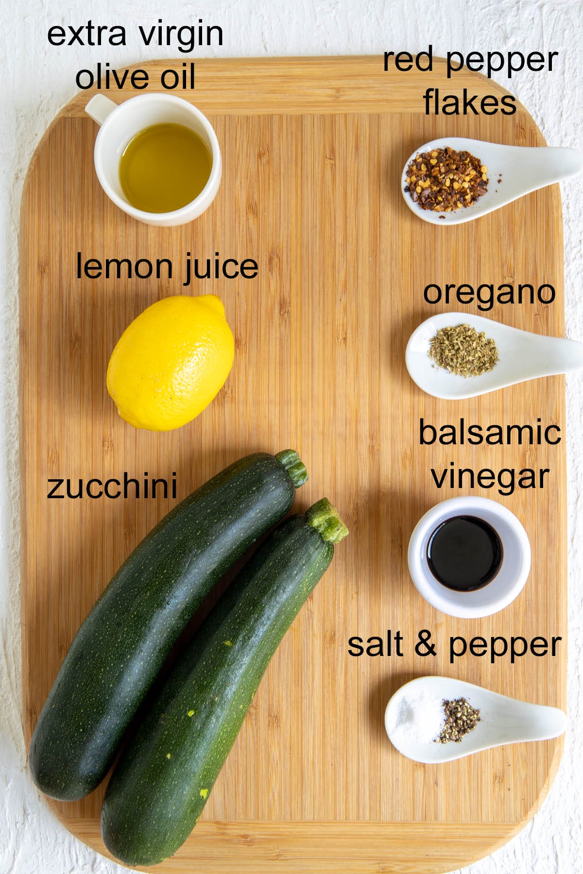 Ingredients on a cutting board with labels.