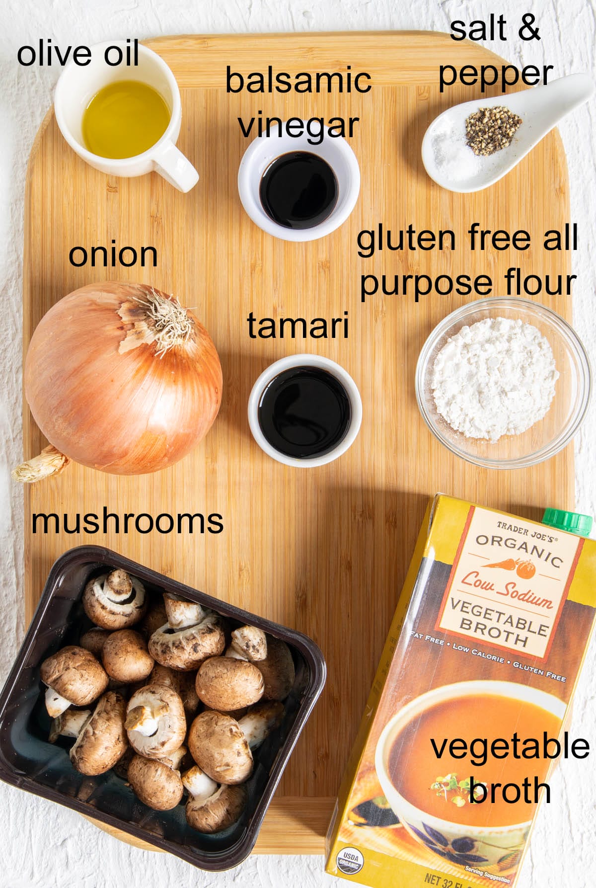 Ingredients on a cutting board with labels.