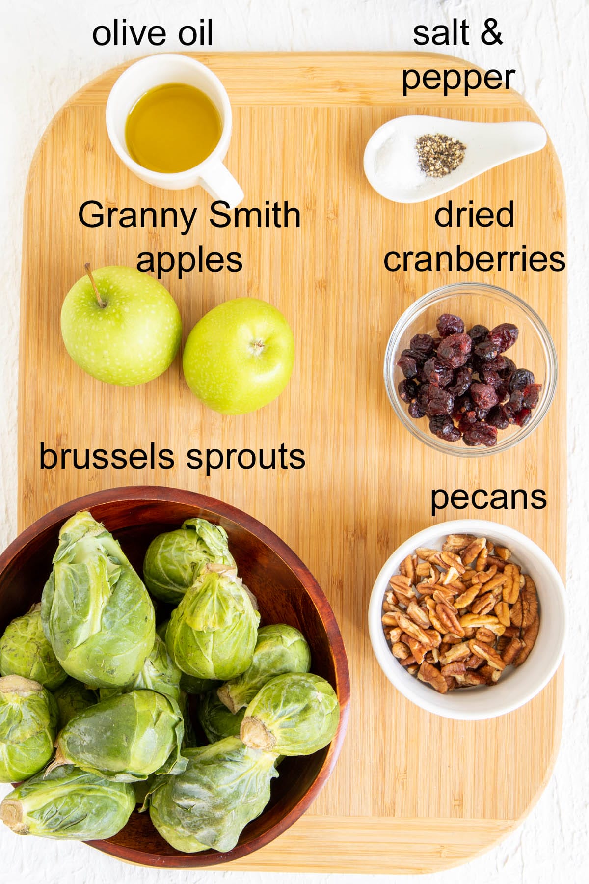 Ingredients on a cutting board with labels.