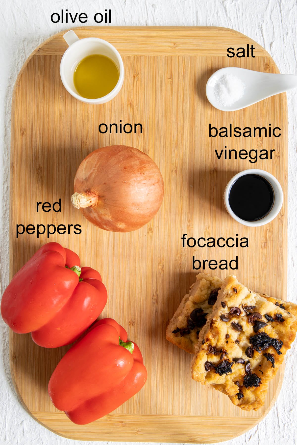Ingredients on a cutting board with labels.