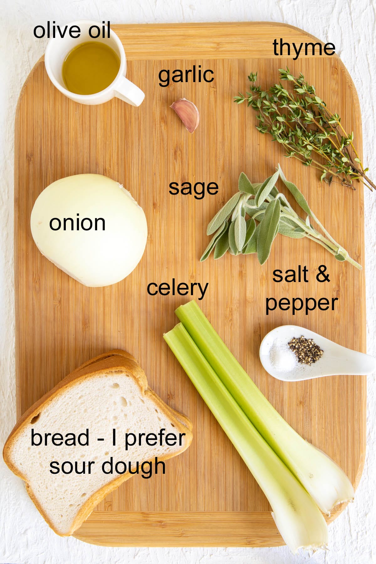 Ingredients on a cutting board with labels.