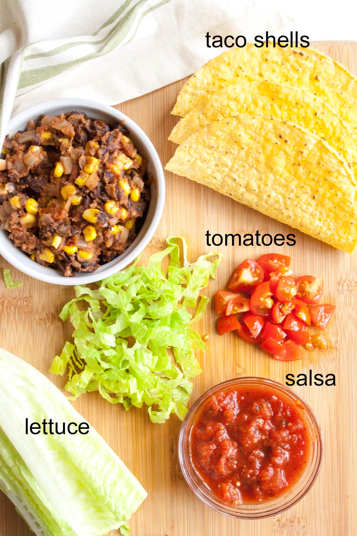Ingredients on a cutting board with labels.