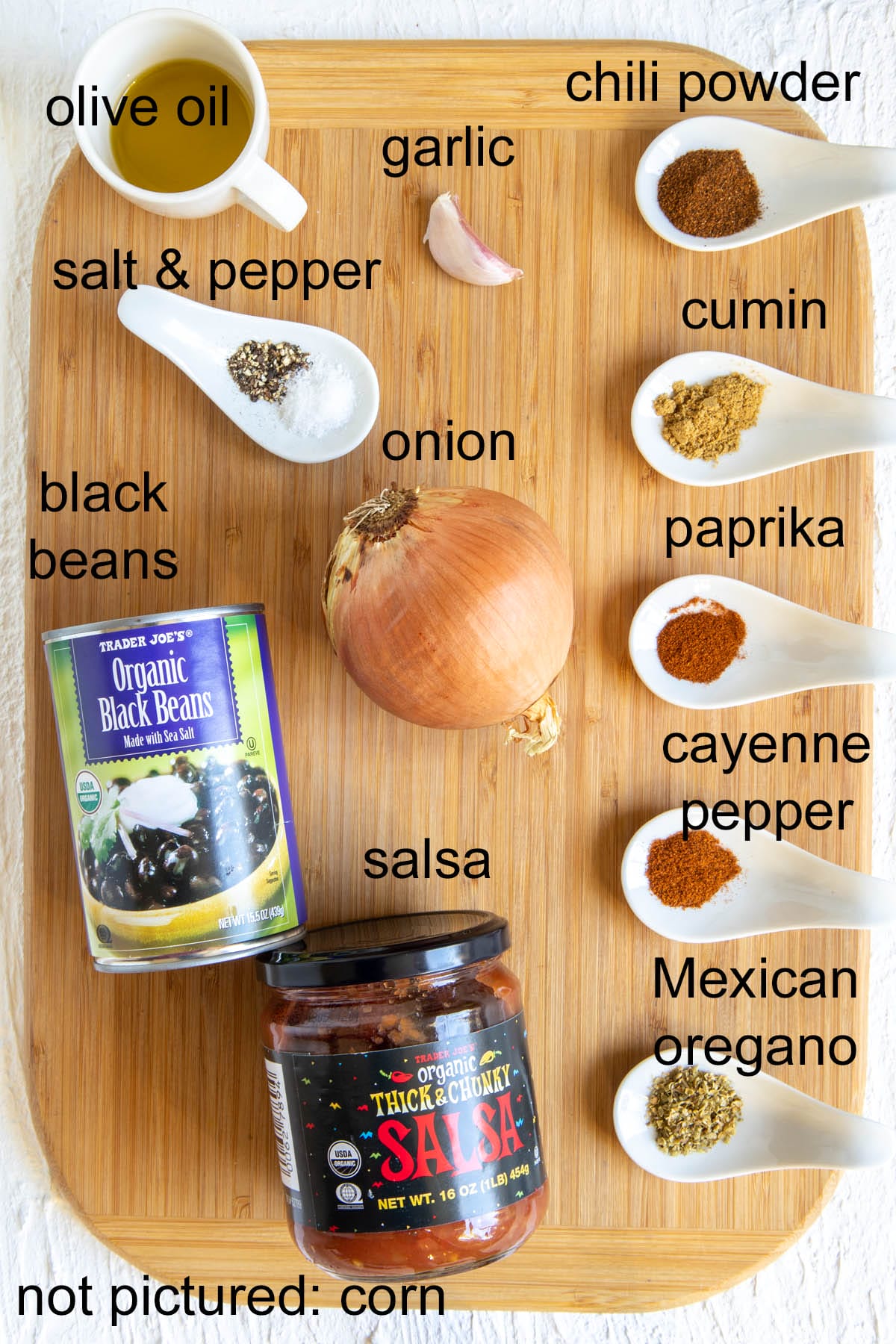 Ingredients on a cutting board with labels.