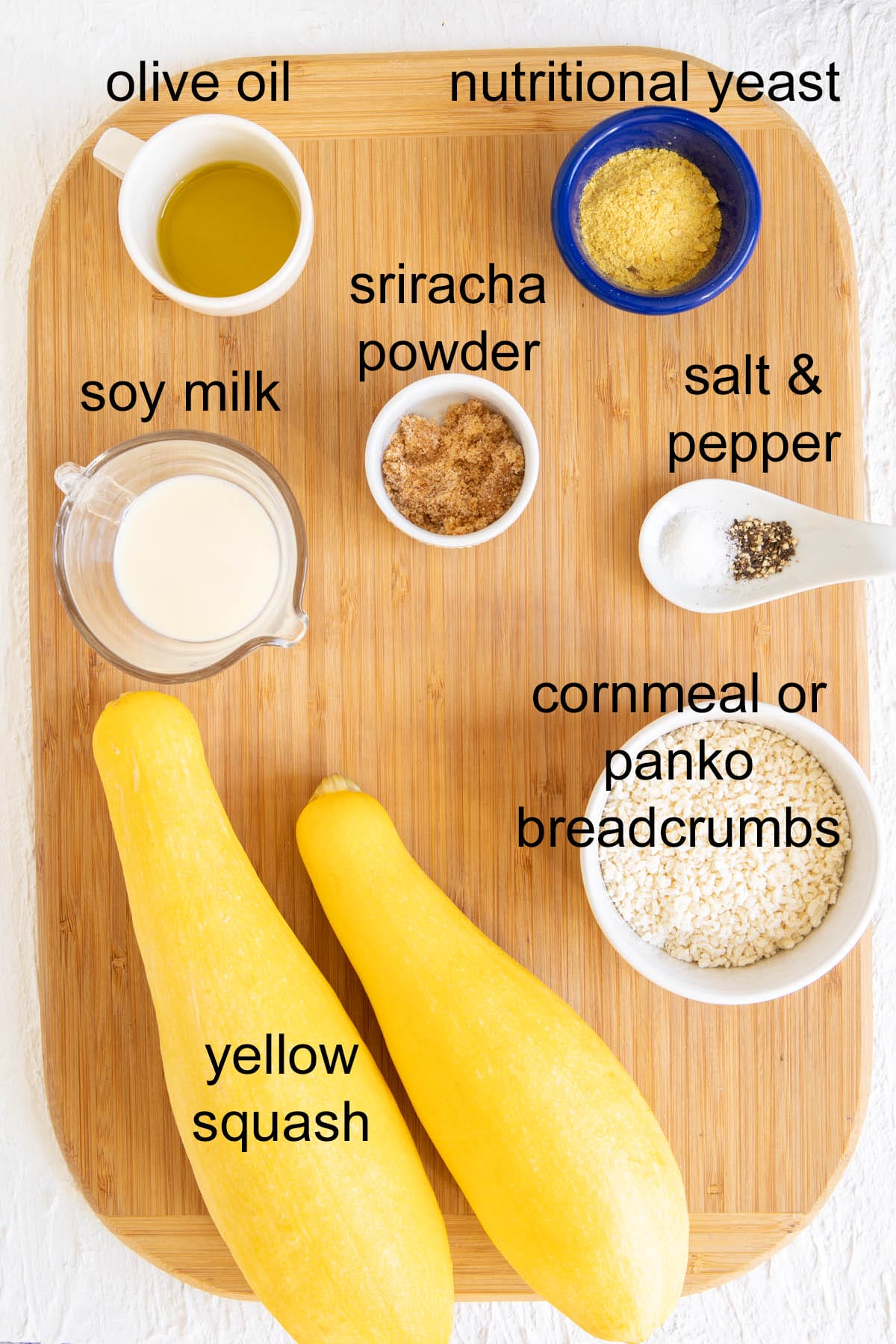 Ingredients on a cutting board with labels.