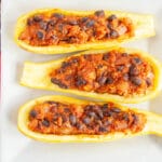 Stuffed Summer Squash Boats on a plate.