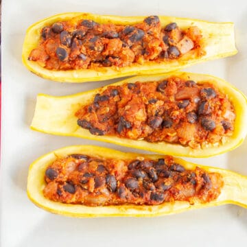 Stuffed Summer Squash Boats on a plate.