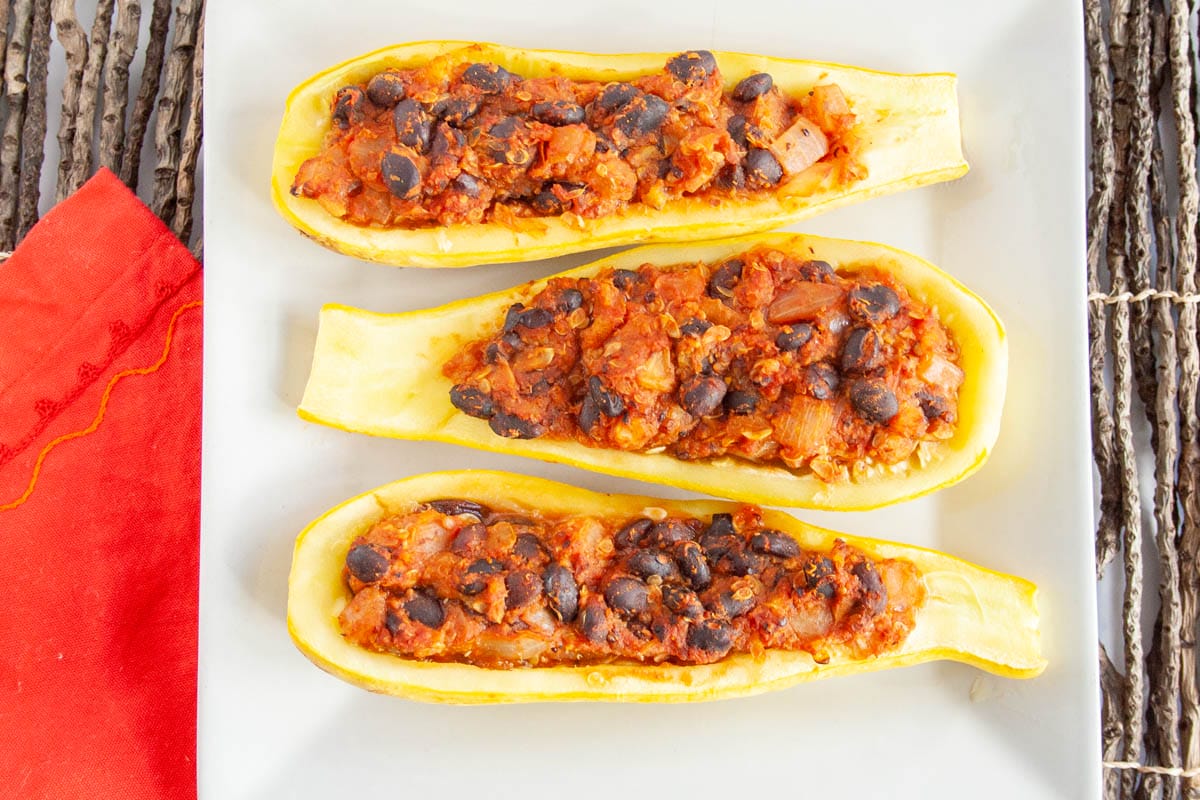 Stuffed Summer Squash Boats on a plate.