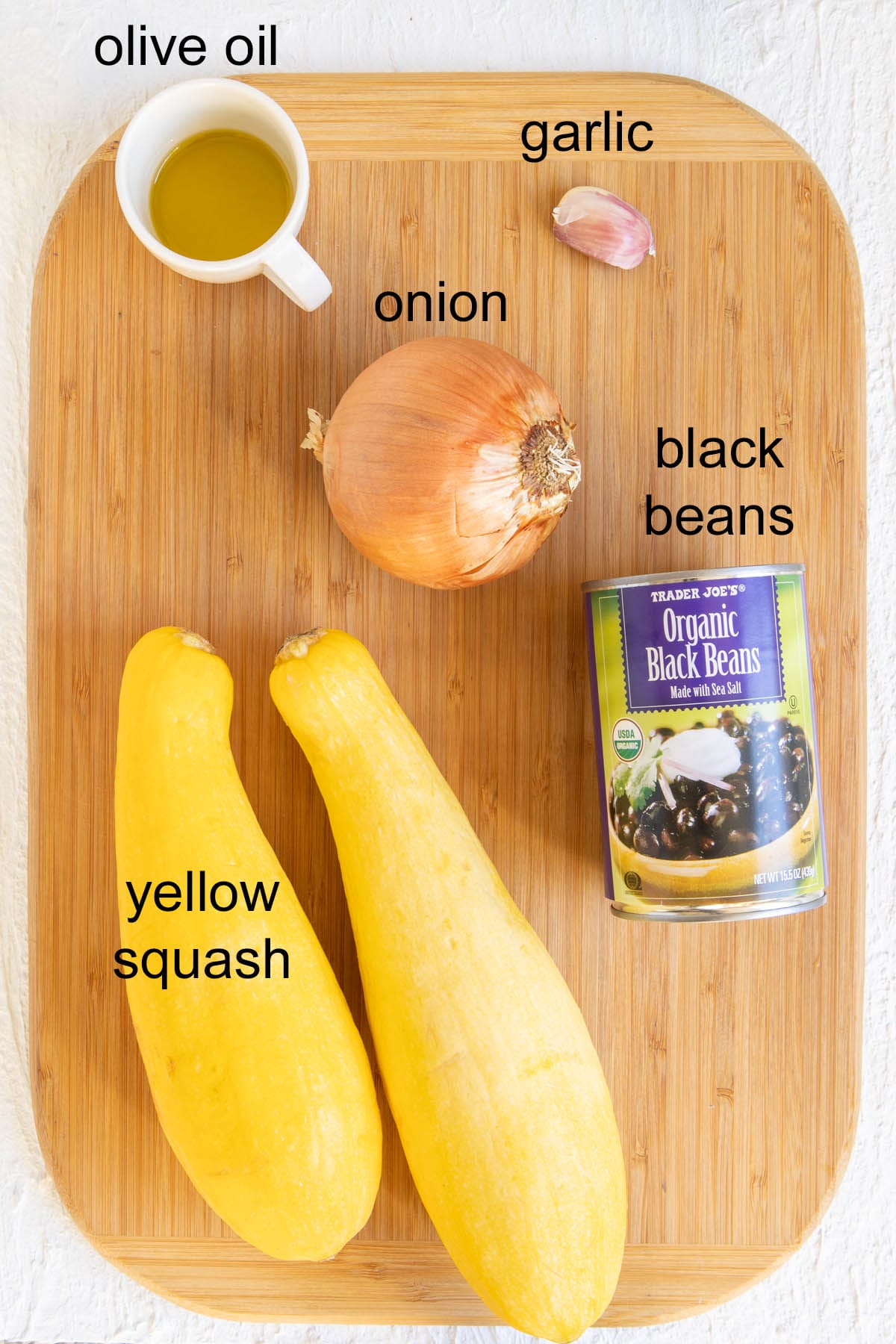 Ingredients on a cutting board with labels.