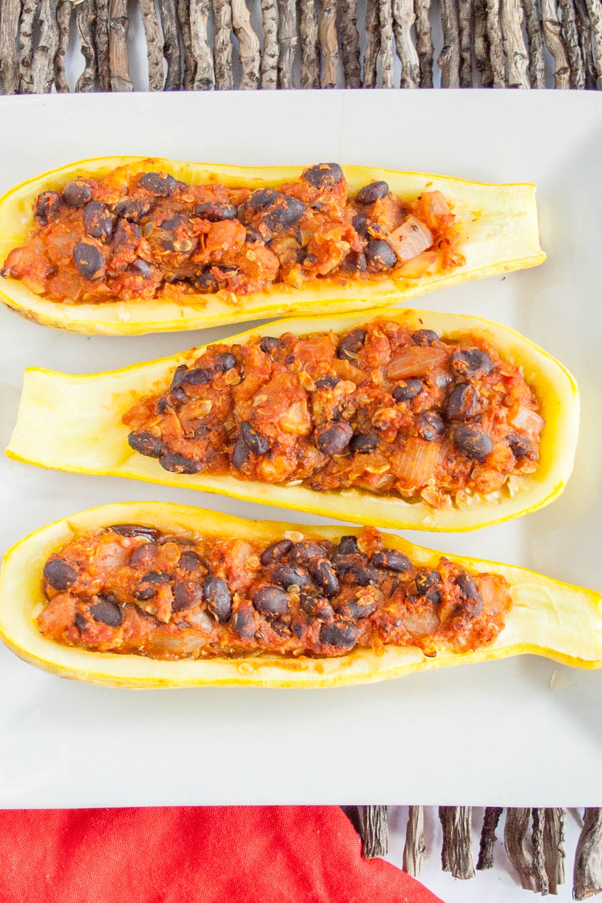 Stuffed Summer Squash Boats on a plate.
