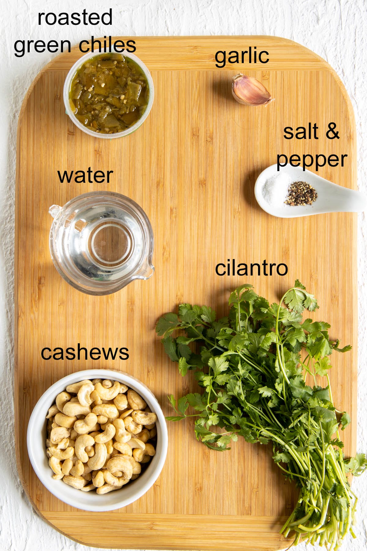 Ingredients on a cutting board with labels.
