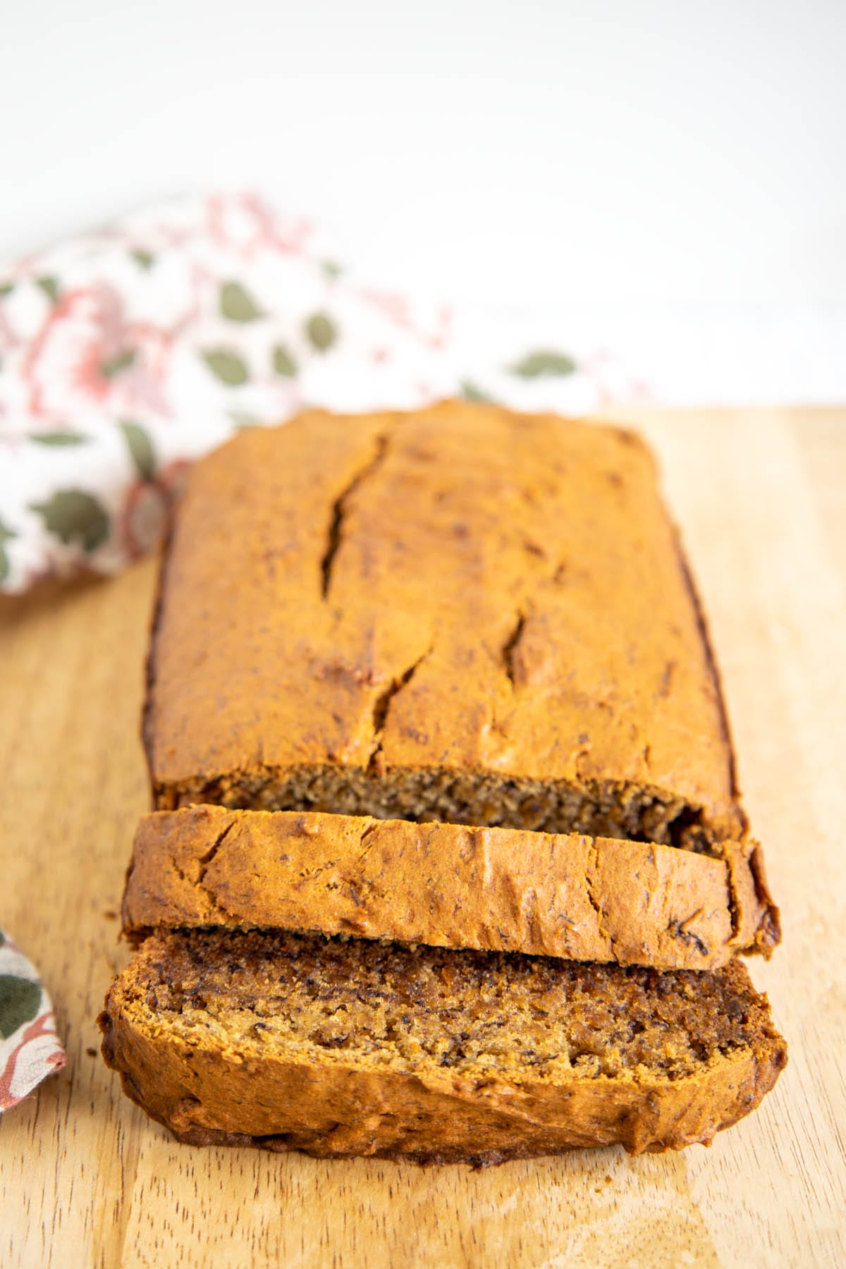 Vegan Gluten Free Banana Bread on a cutting board.