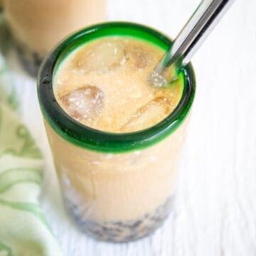 Coconut Bubble Tea in two glasses with straw.