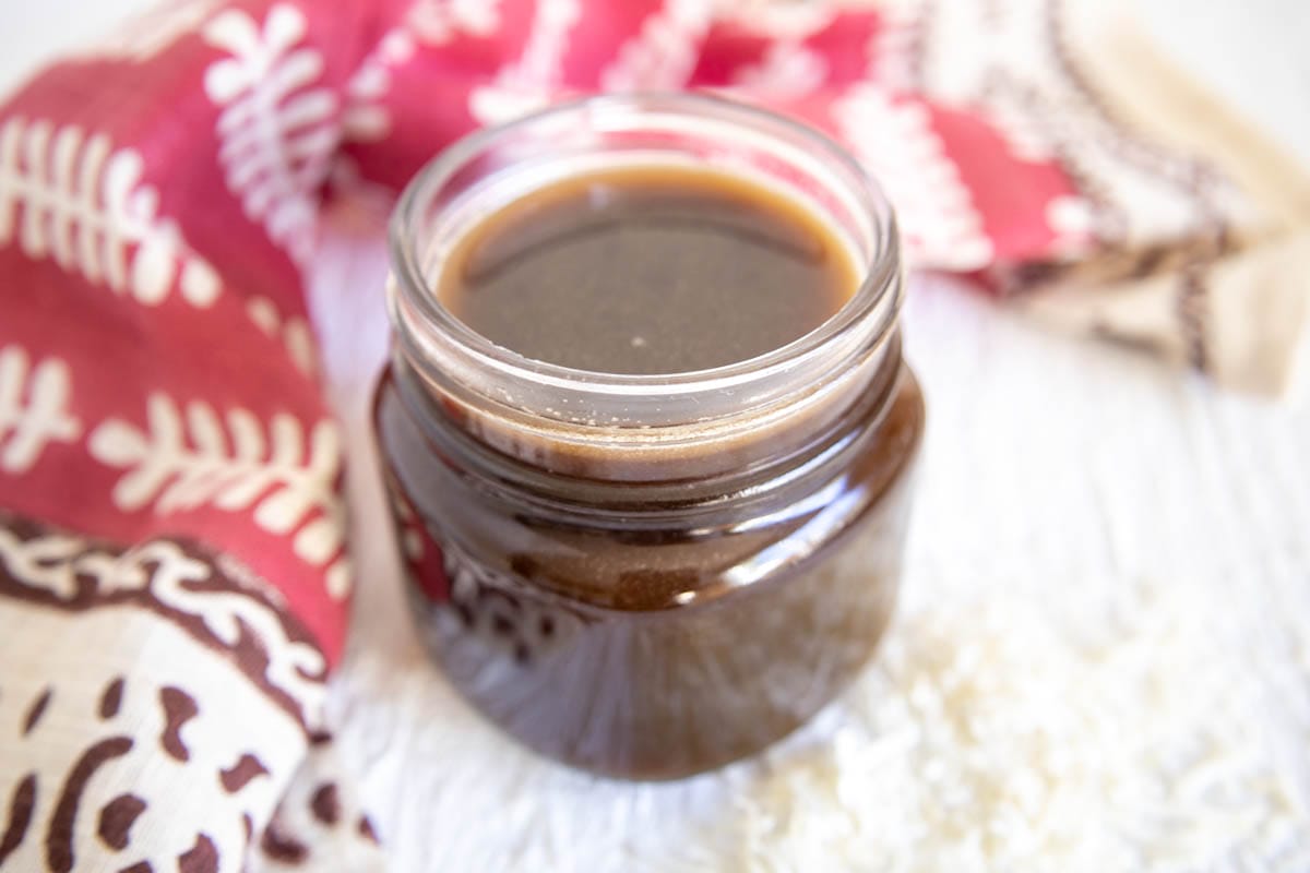 Coconut Simple Syrup in a mason jar.