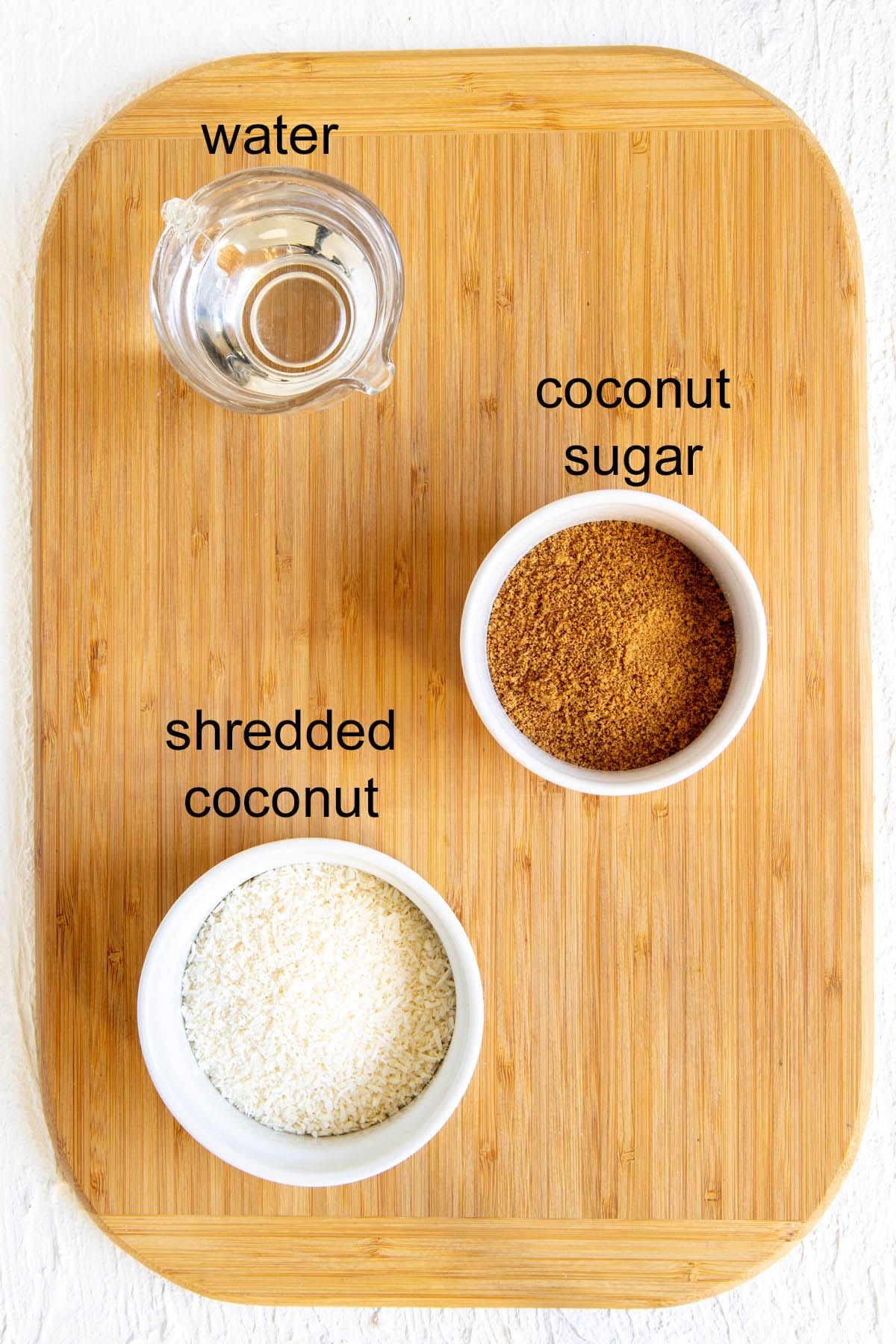 Ingredients on a cutting board with labels.