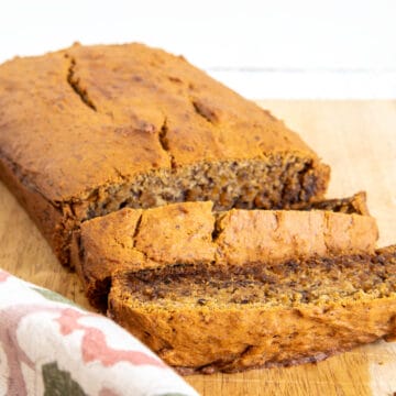 Vegan Gluten Free Banana Bread on a cutting board.