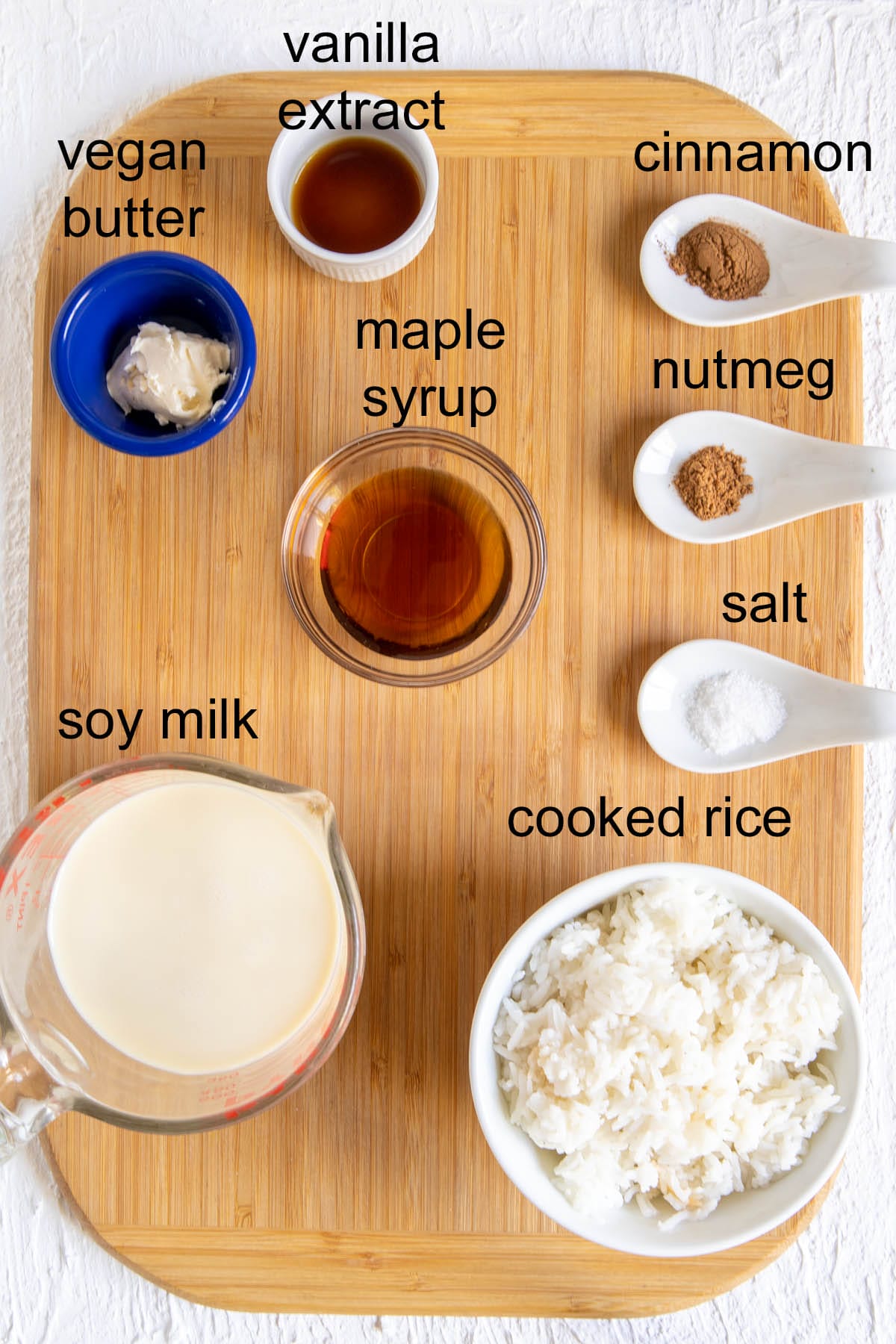 Ingredients on a cutting board with labels.