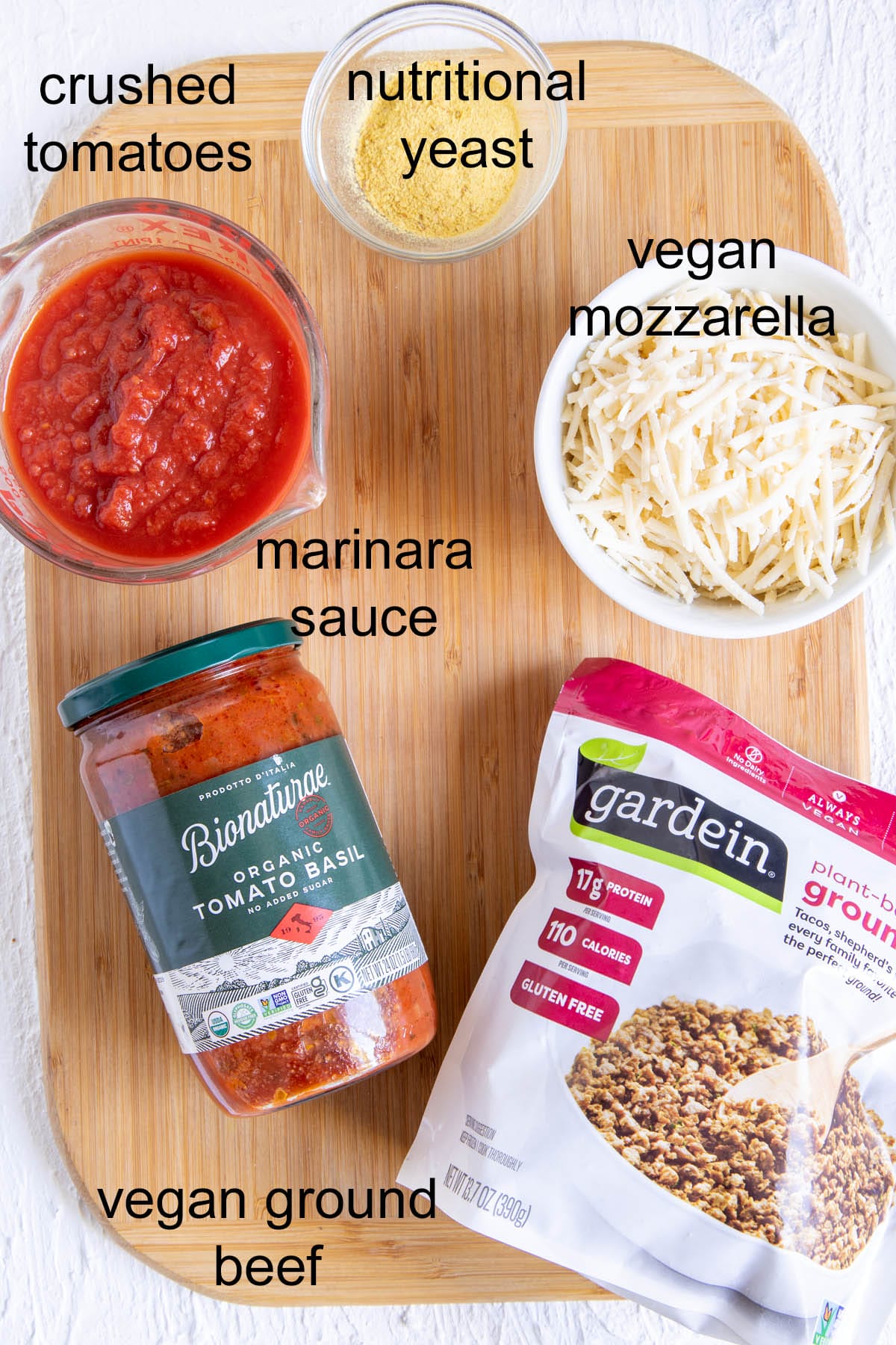 Ingredients on a cutting board with labels.