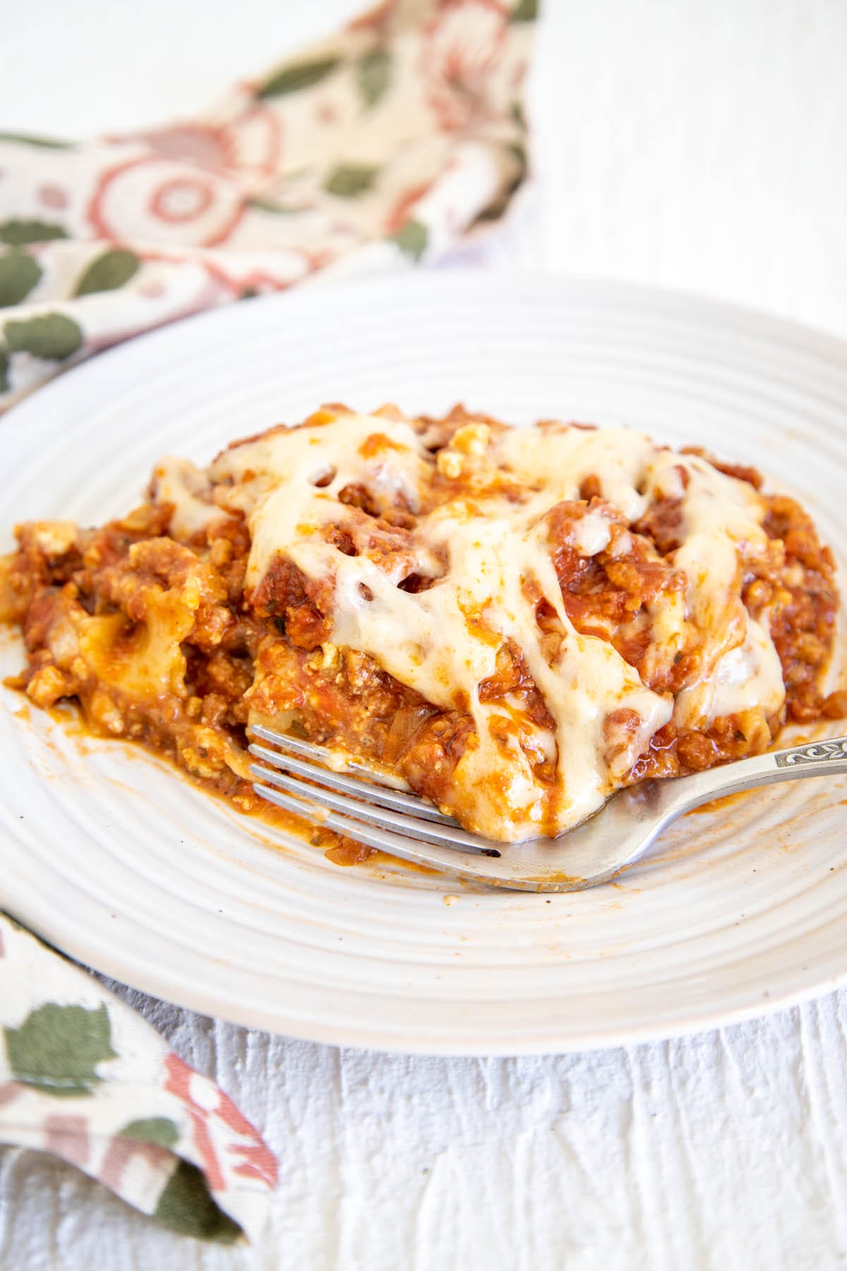 Vegan Slow Cooker Lasagna on a plate with fork.