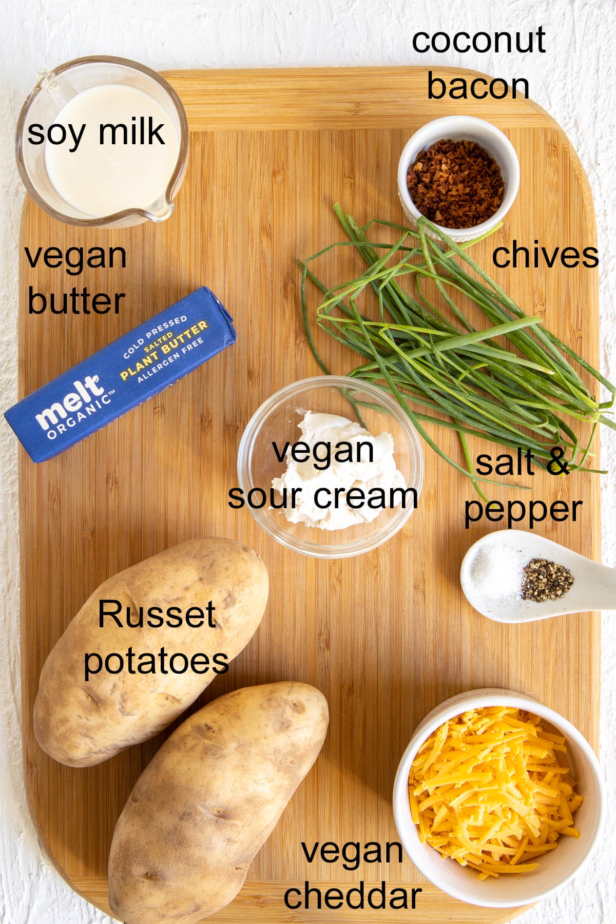 Ingredients on a cutting board with labels.