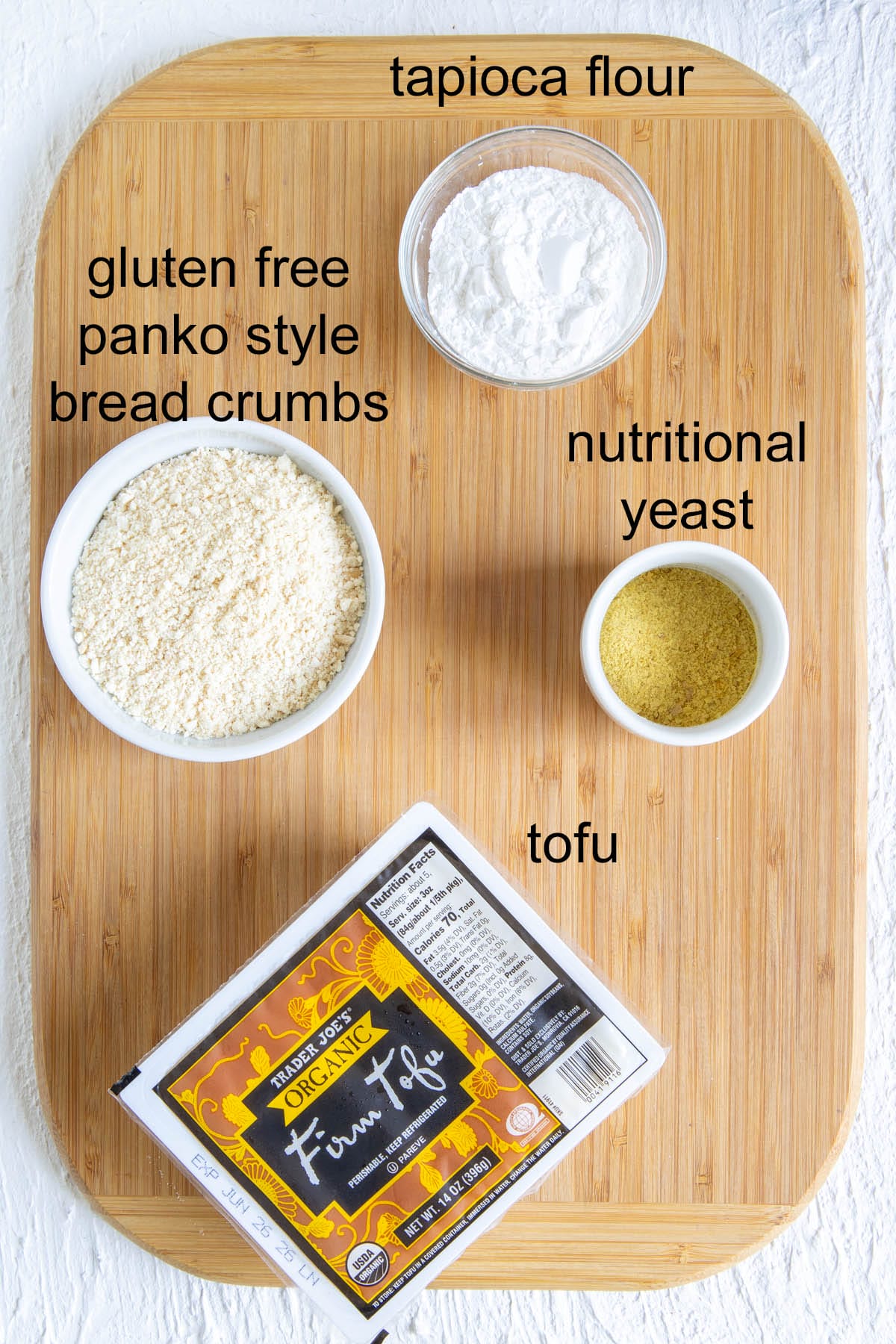 Ingredients on a cutting board with labels.