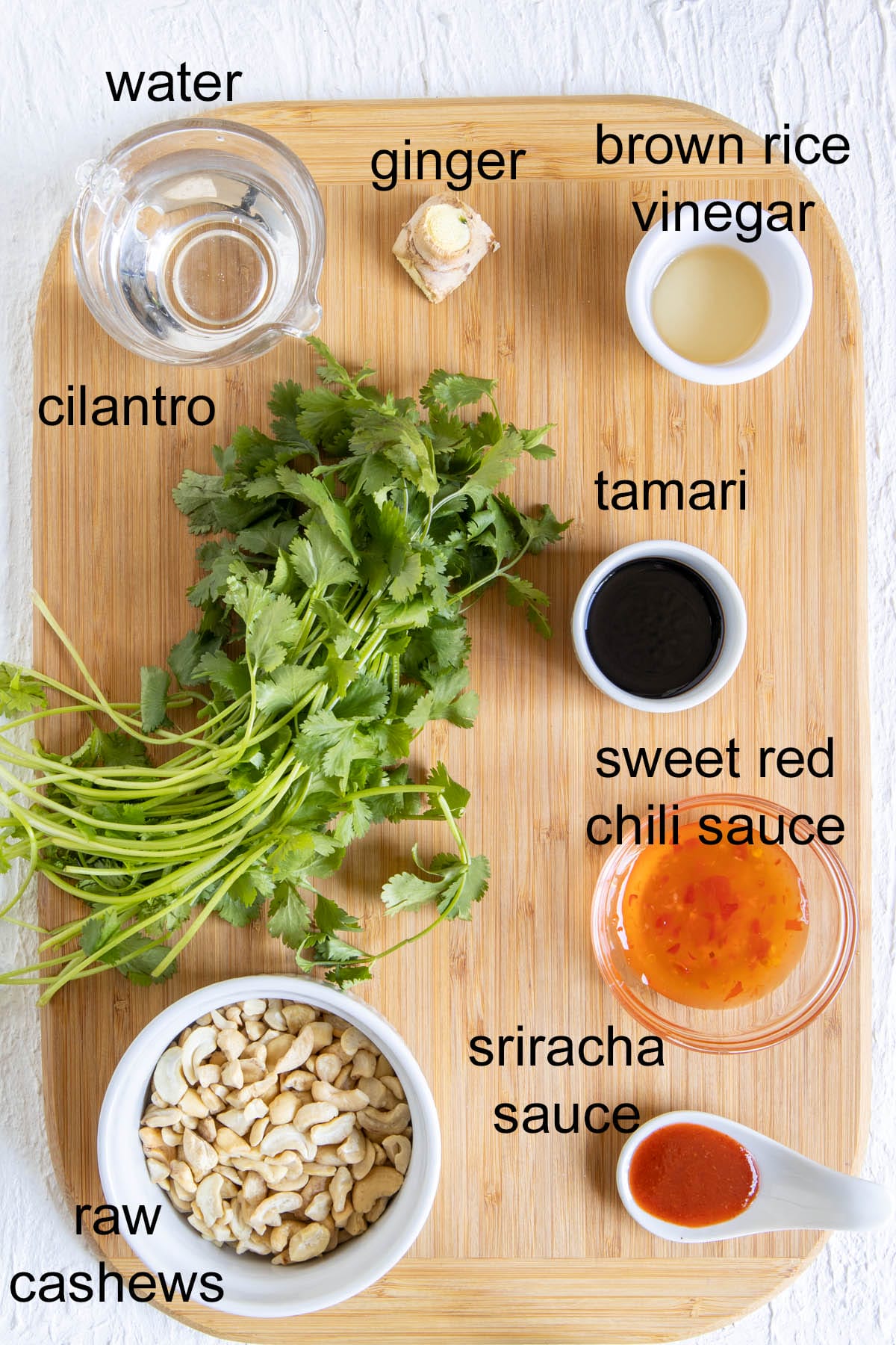 Ingredients on a cutting board with labels.