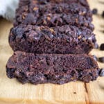 Vegan Chocolate Zucchini Bread on a cutting board.