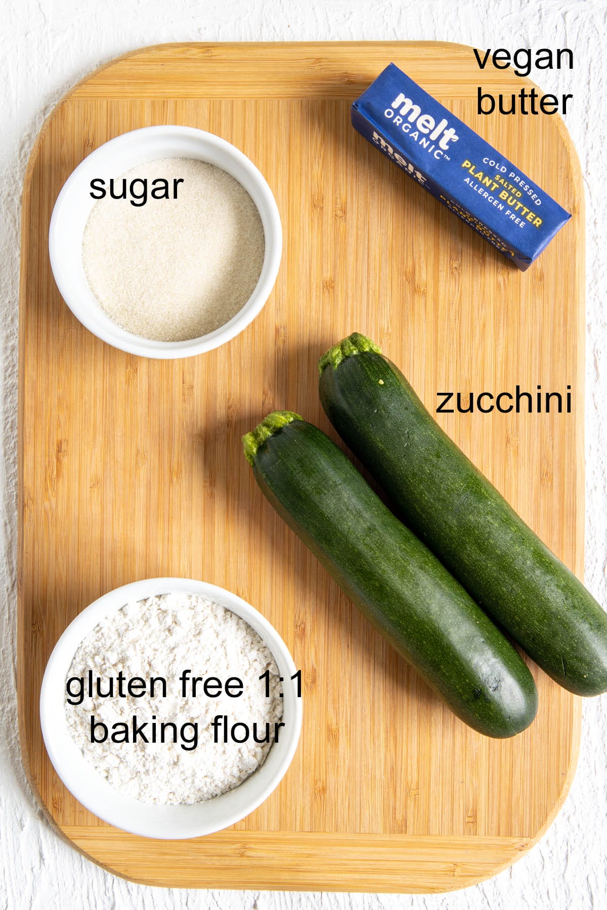 Ingredients on a cutting board with labels.