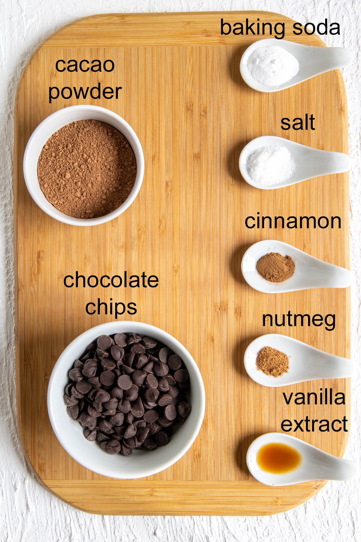 Ingredients on a cutting board with labels.