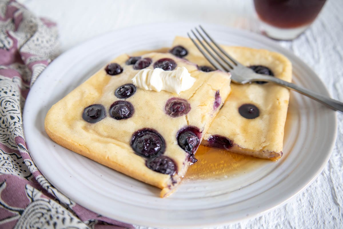 Vegan Sheet Pan Pancakes on a plate with fork.