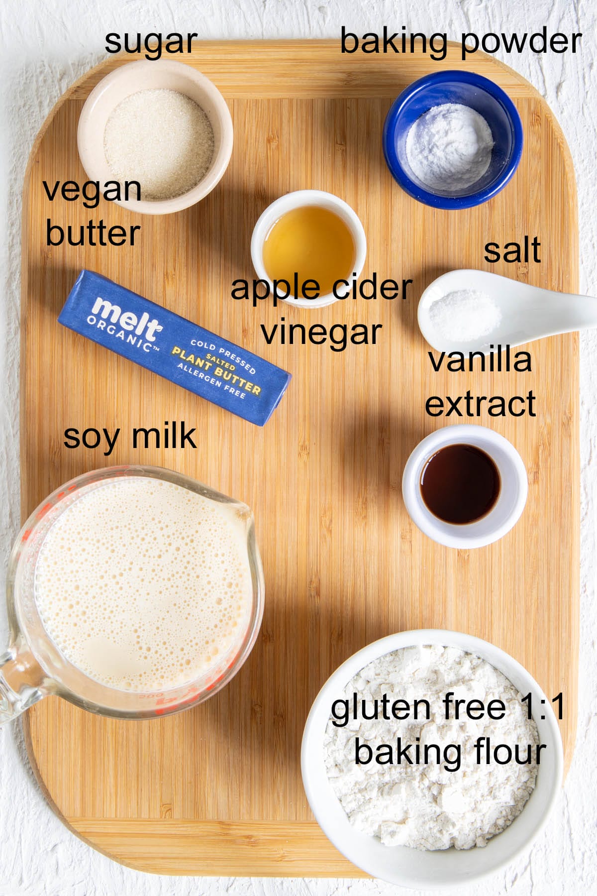 Ingredients on a cutting board with labels.