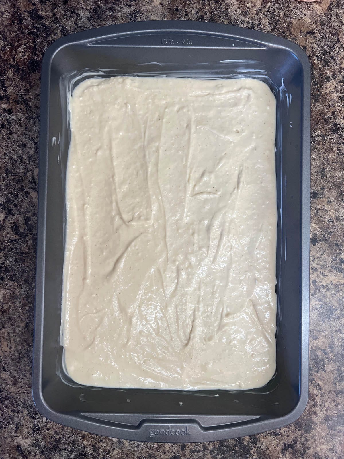 Pancake batter in a baking pan.