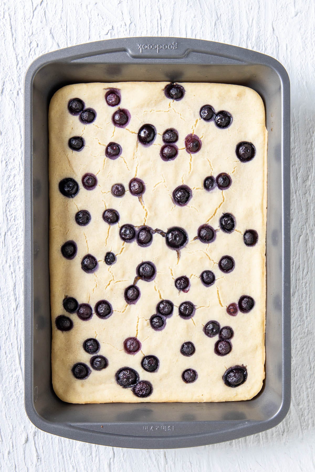 Baked sheet pan pancakes in a pan.
