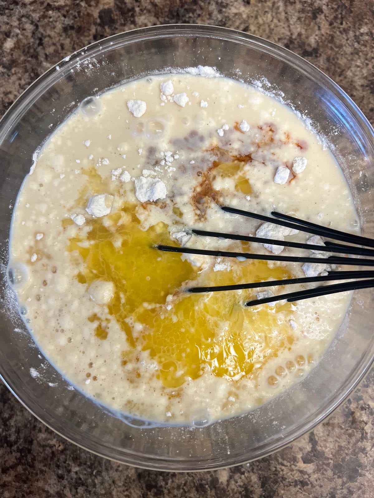 Wet ingredients added to the mixing bowl.
