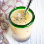 Lavender Bubble Tea in a glass with a straw.