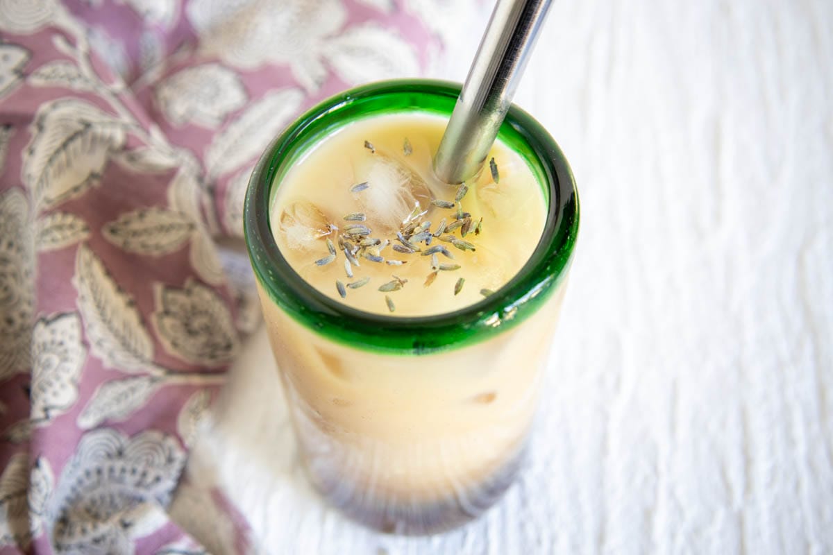 Pumpkin Chickpea Blondies (vegan, gluten free) - These sweet moist bars are a healthy treat. You would never know there's chickpeas in them. #chickpeablondies #pumpkinblondies Lavender Bubble Tea in a glass with a straw.