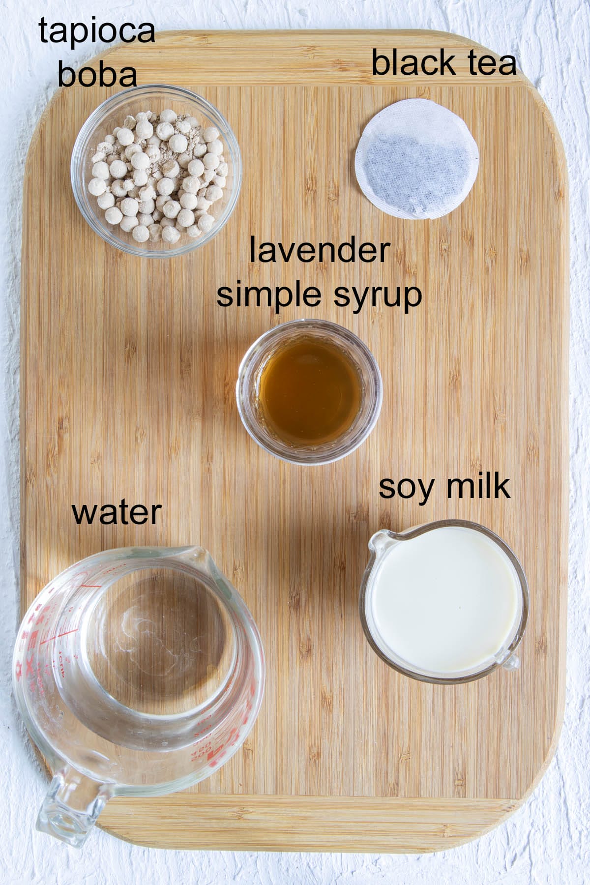 Ingredients on a cutting board with labels.