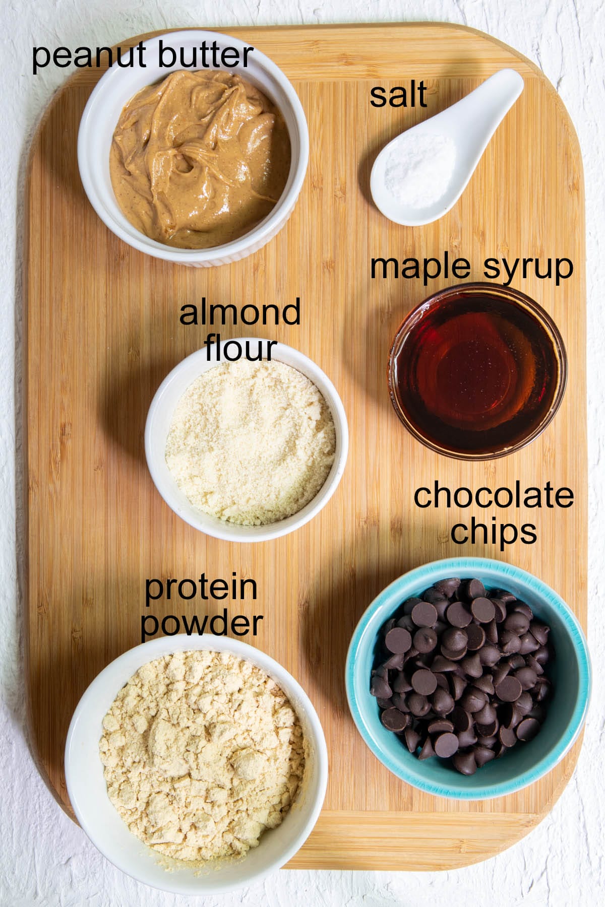 Ingredients on a cutting board with labels.