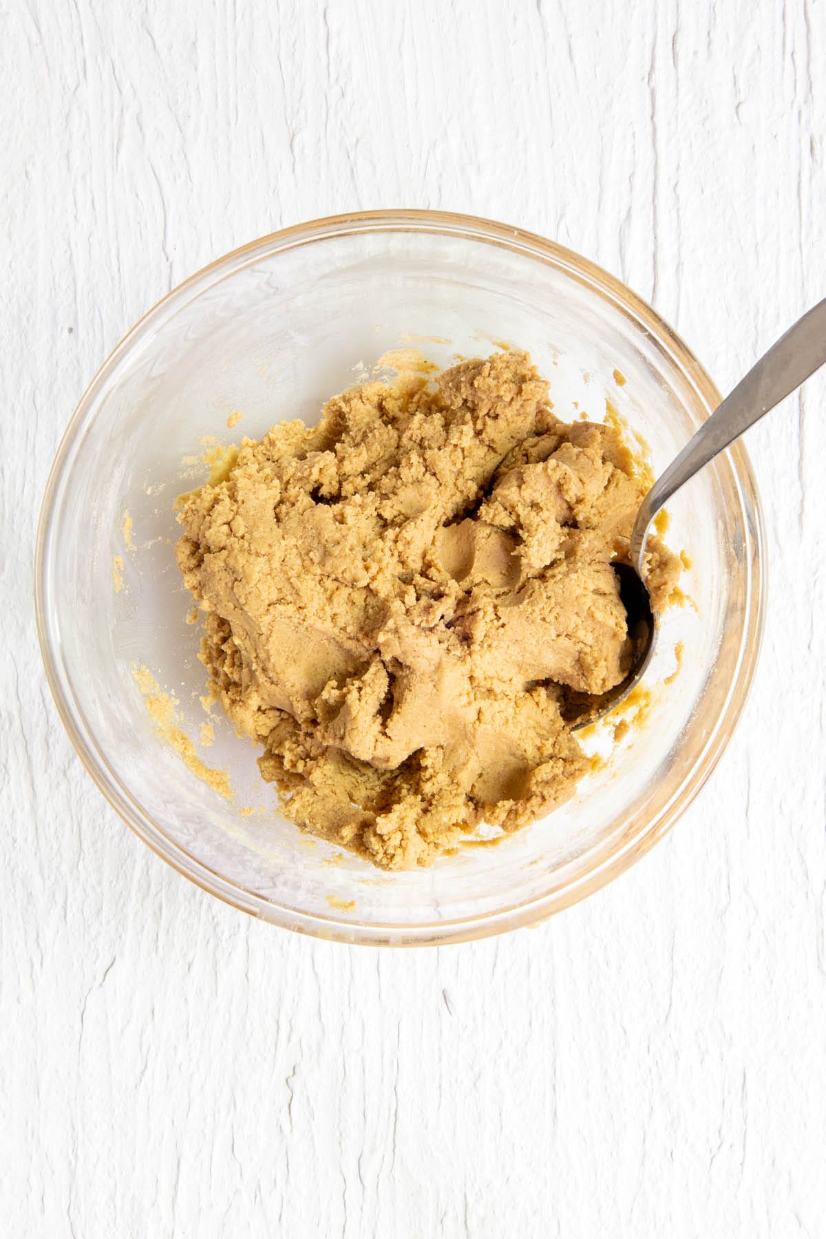 Mixed protein ball dough in a mixing bowl.