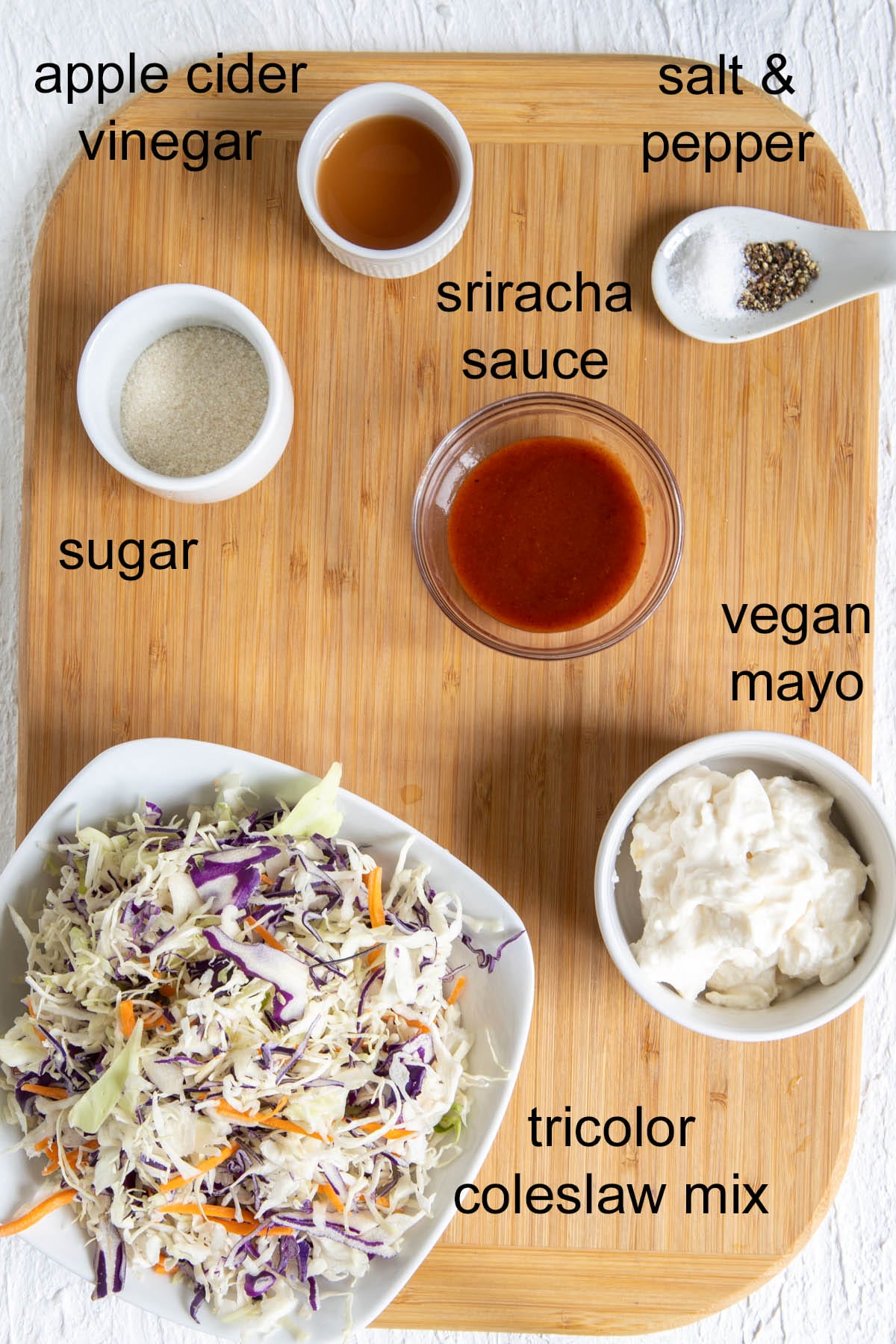 Ingredients on a cutting board with labels.
